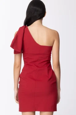 Mangano Mangano: Abito Da Sera Tubino Corto Monospalla In Tessuto Tecnico con Dettaglio Fiocco Sulla SpallaBLOODY RED